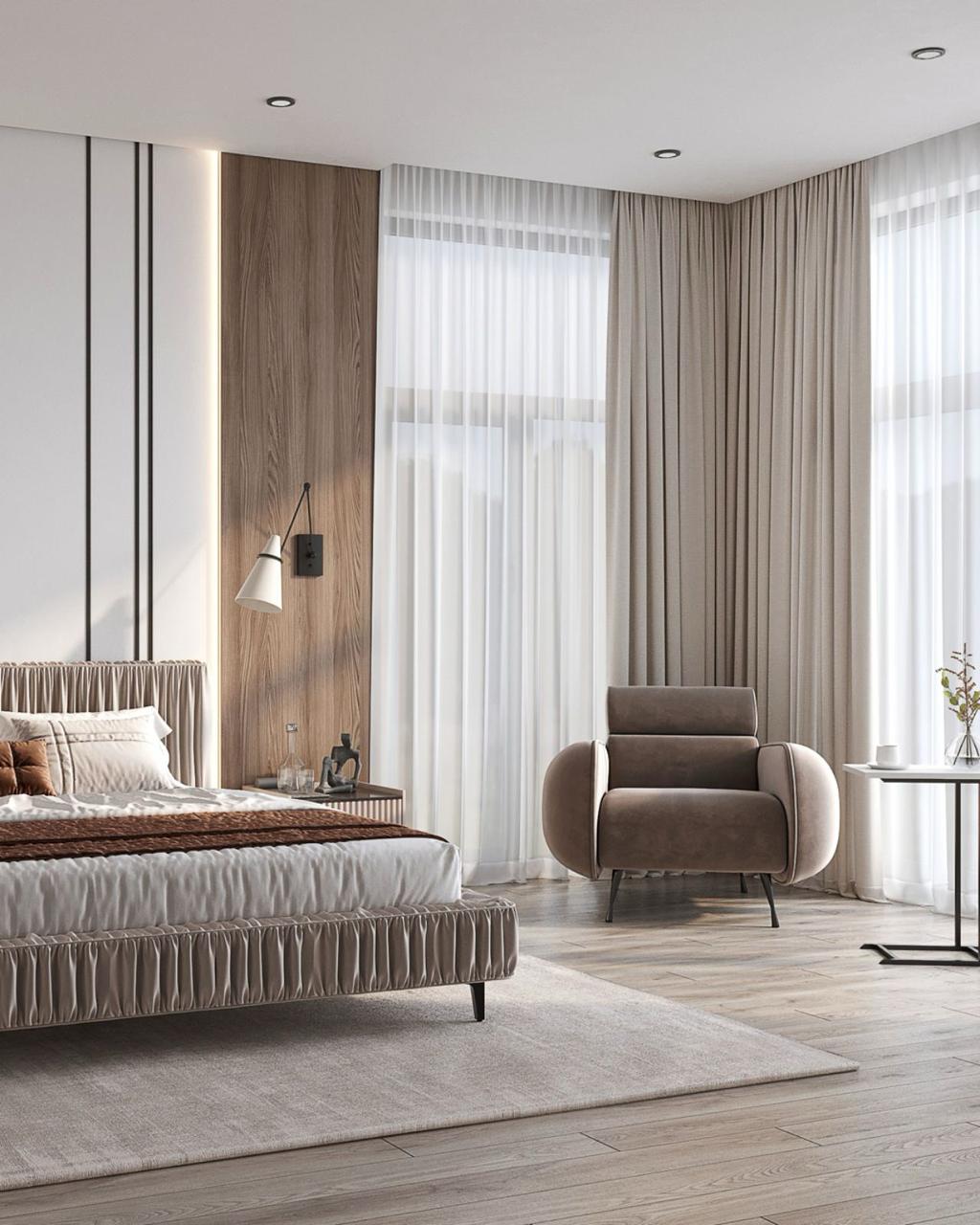 Schlafzimmer mit Lounge-Sessel